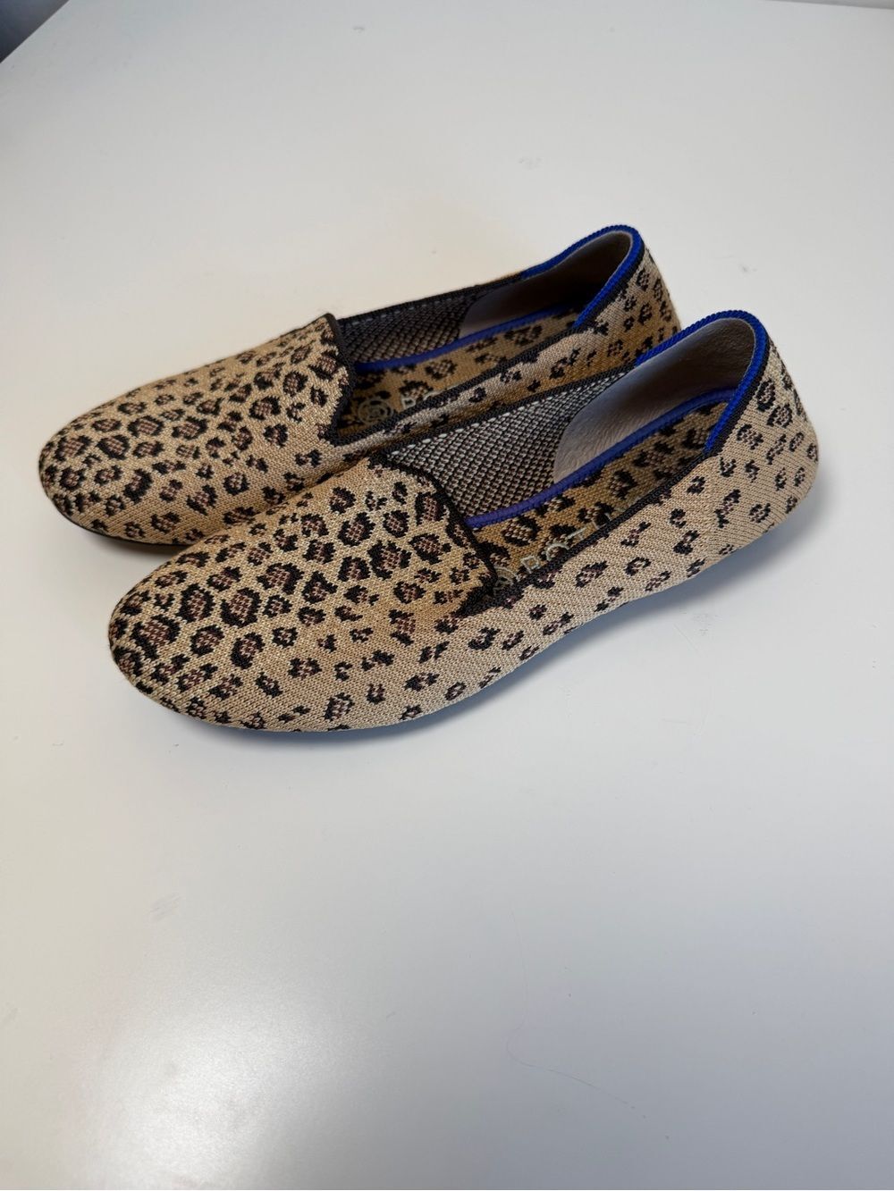 Rothy's Leopard Print Flats with Blue Trim